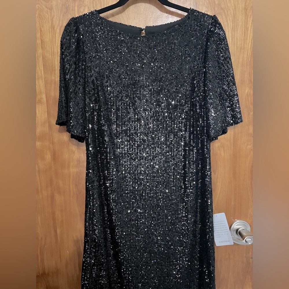 Holiday evening black sequin knee length party evening dress with flutter sleeve